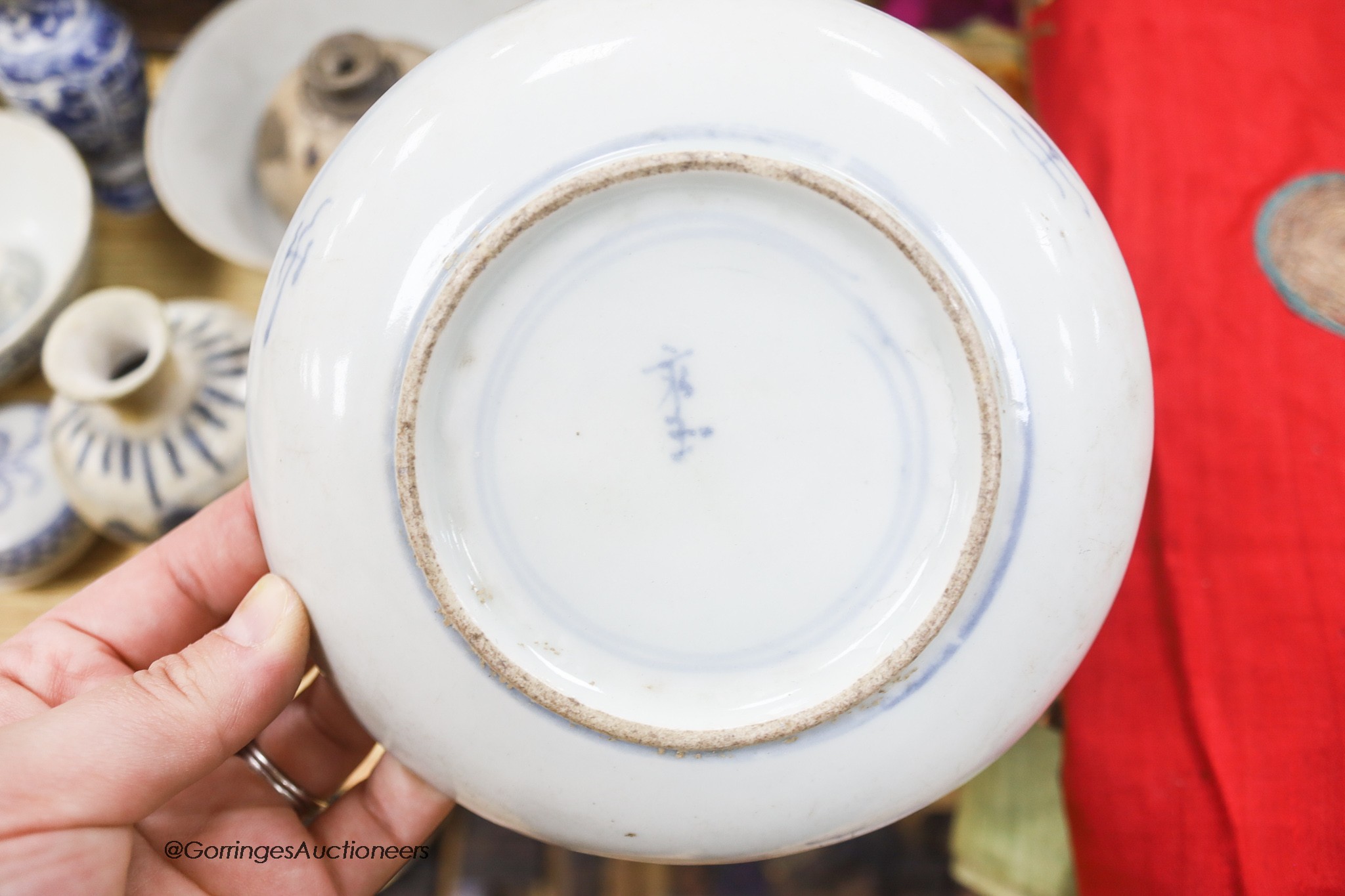 A collection of Chinese and Annamese shipwreck ceramics, Song to 19th century including bowls and vases, together with two graduated wicker baskets